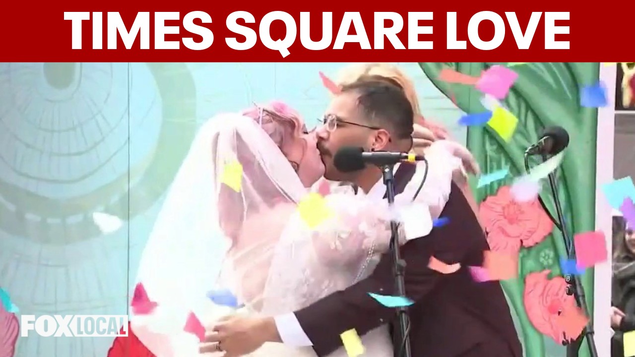 Video thumbnail for Couples say ‘I do’ in Times Square on Valentine’s Day