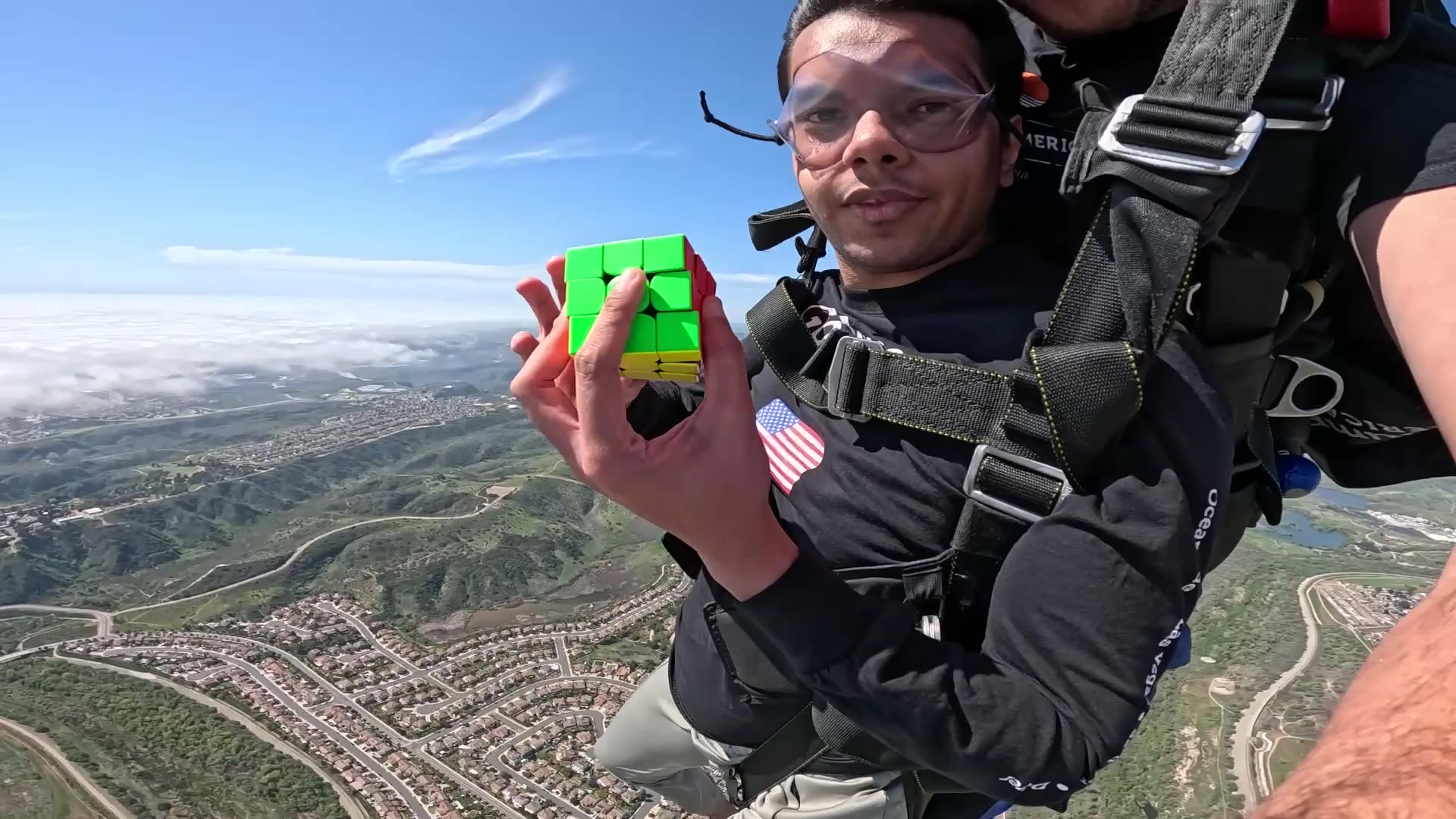 Video thumbnail for Most Rotating Puzzle Cubes Solved In A Single Skydive