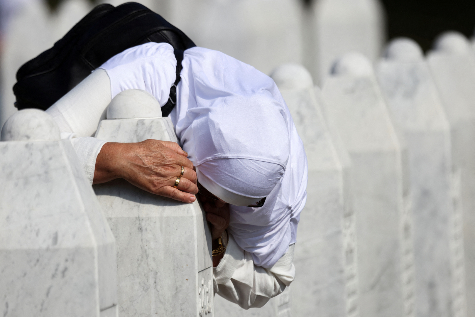 'Video thumbnail for Families gather in Bosnia to remember Srebrenica genocide victims, decades on'