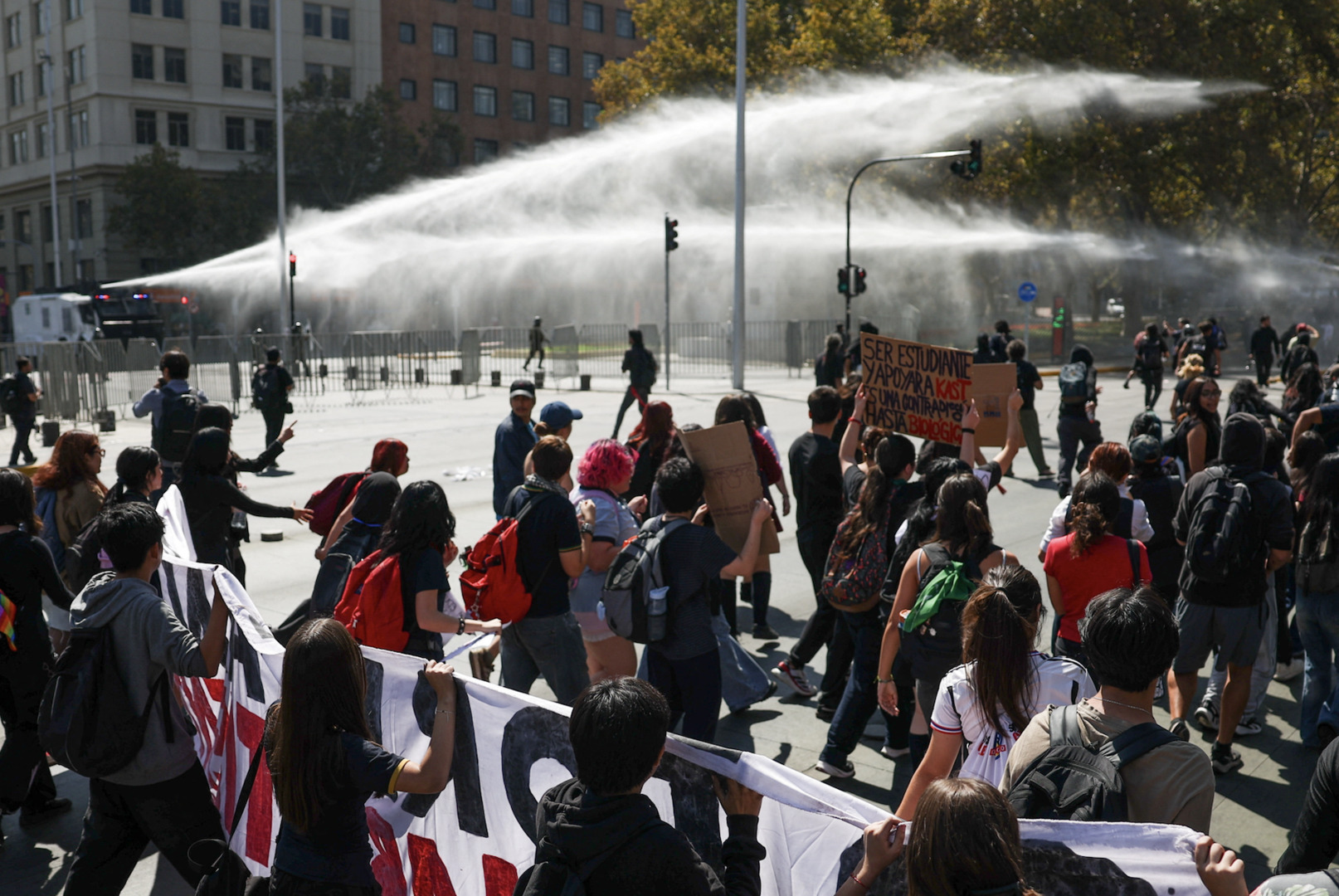 Video thumbnail for Police fire water cannons at Chile student protest