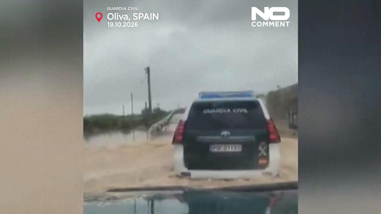 Video thumbnail for Spain: Guardia Civil rescues family and dogs from rising floodwaters in Oliva