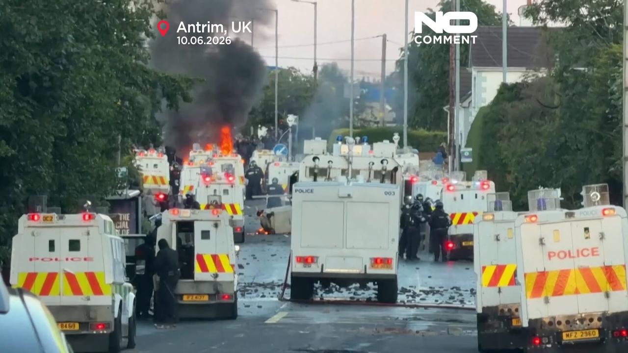 Video thumbnail for Clashes erupt as police use water cannon near Belfast