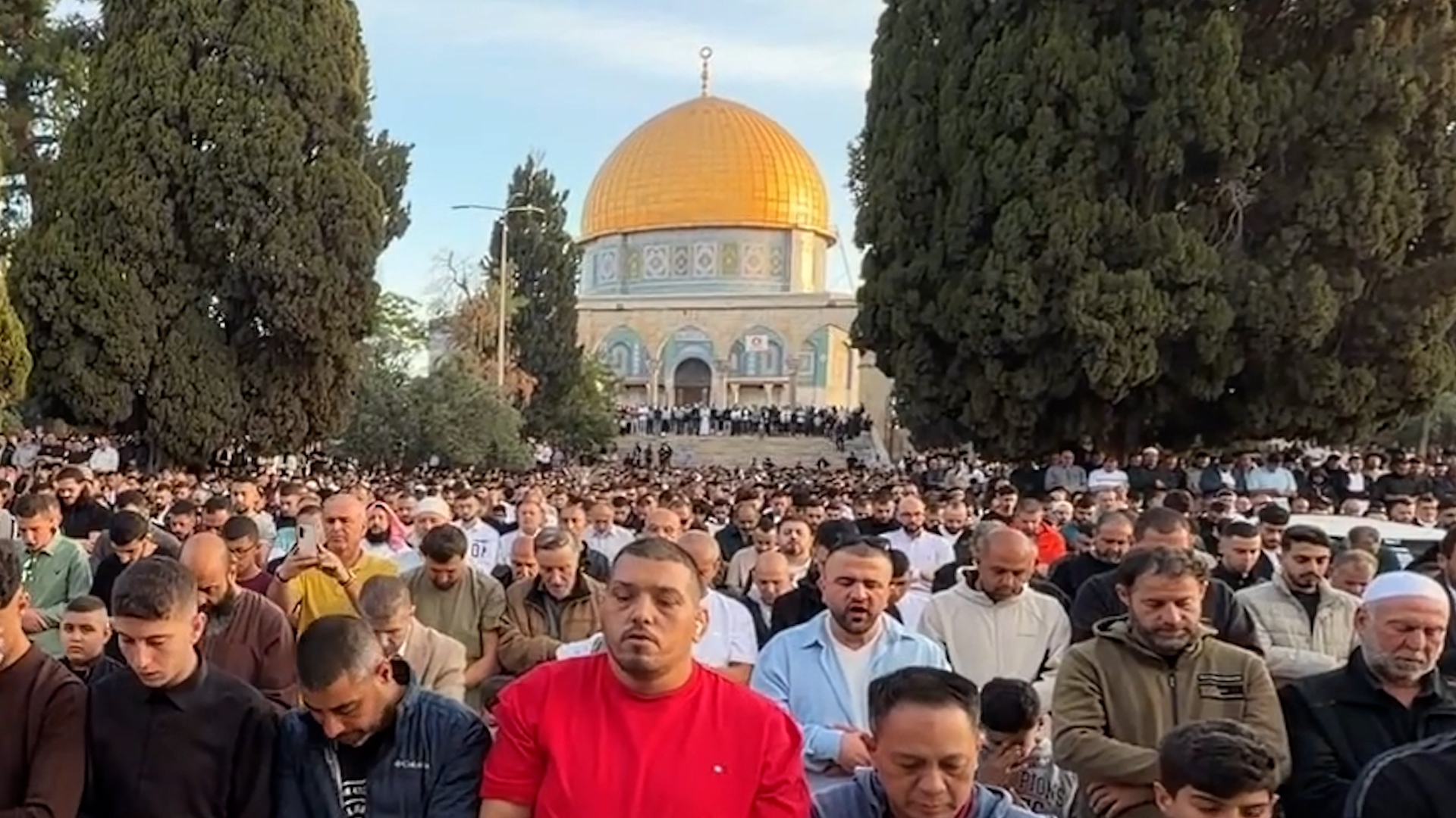Video thumbnail for Muslims around the world attend Eid prayers