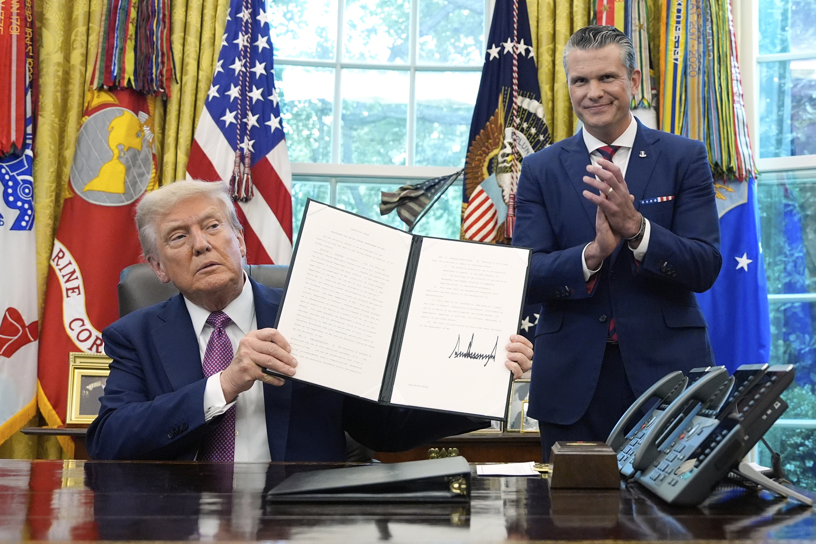 'Video thumbnail for Rebranding US defense department: Trump signs order changing title to department of war'