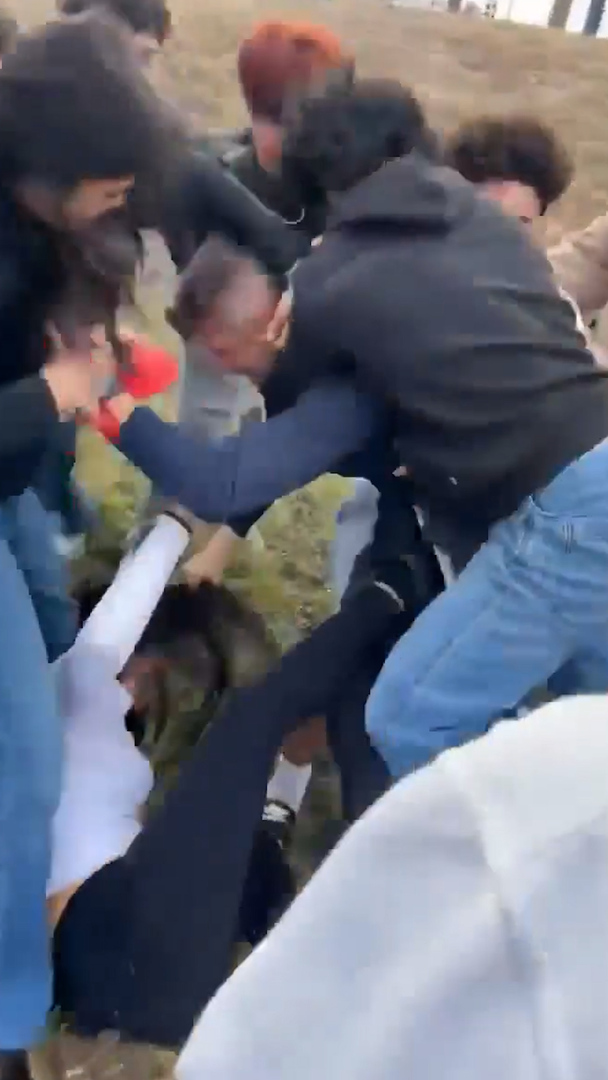 Video thumbnail for Video shows man fighting high school students at anti-ICE protest