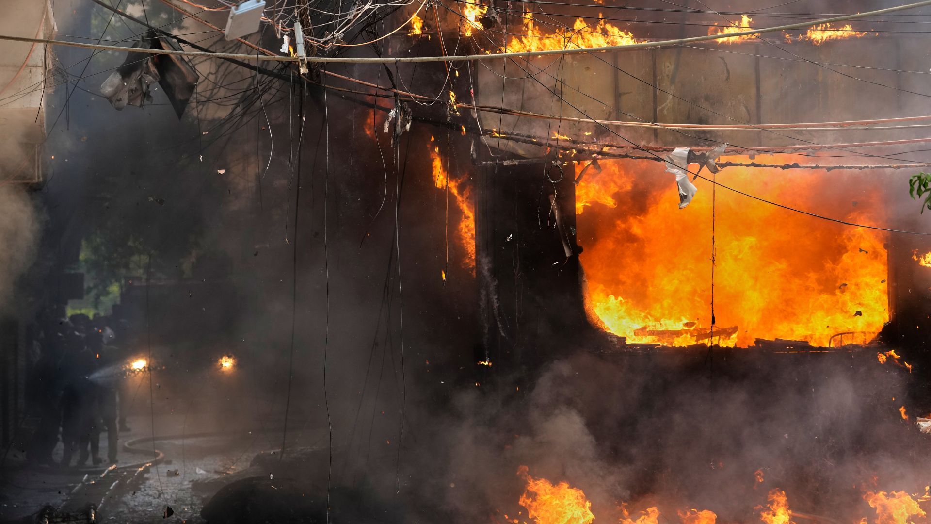 Video thumbnail for Fire at New Delhi hotel kills at least 21 people, including 18 foreigners
