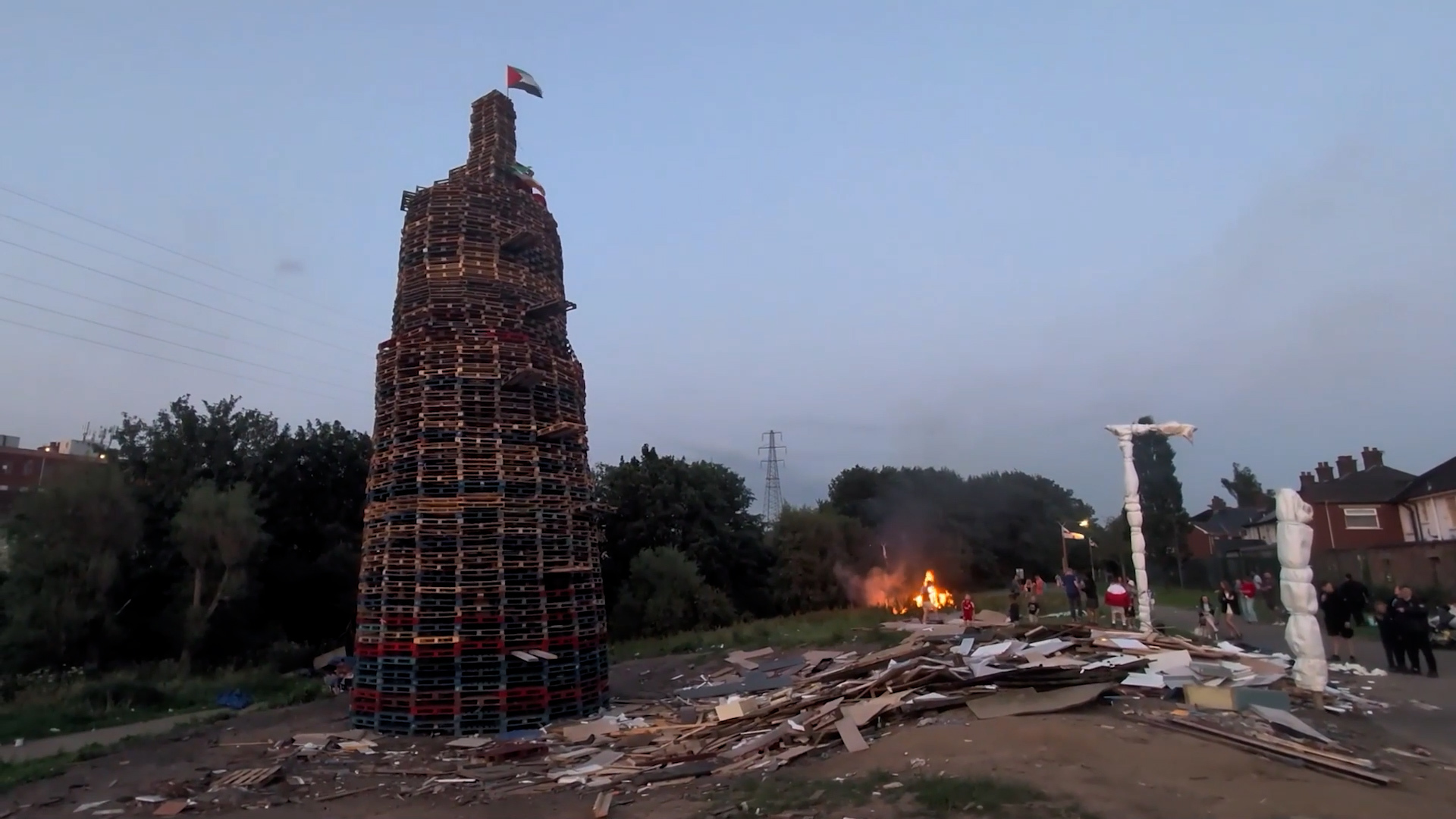 Video thumbnail for Anti-migrant display set alight in Northern Ireland bonfire