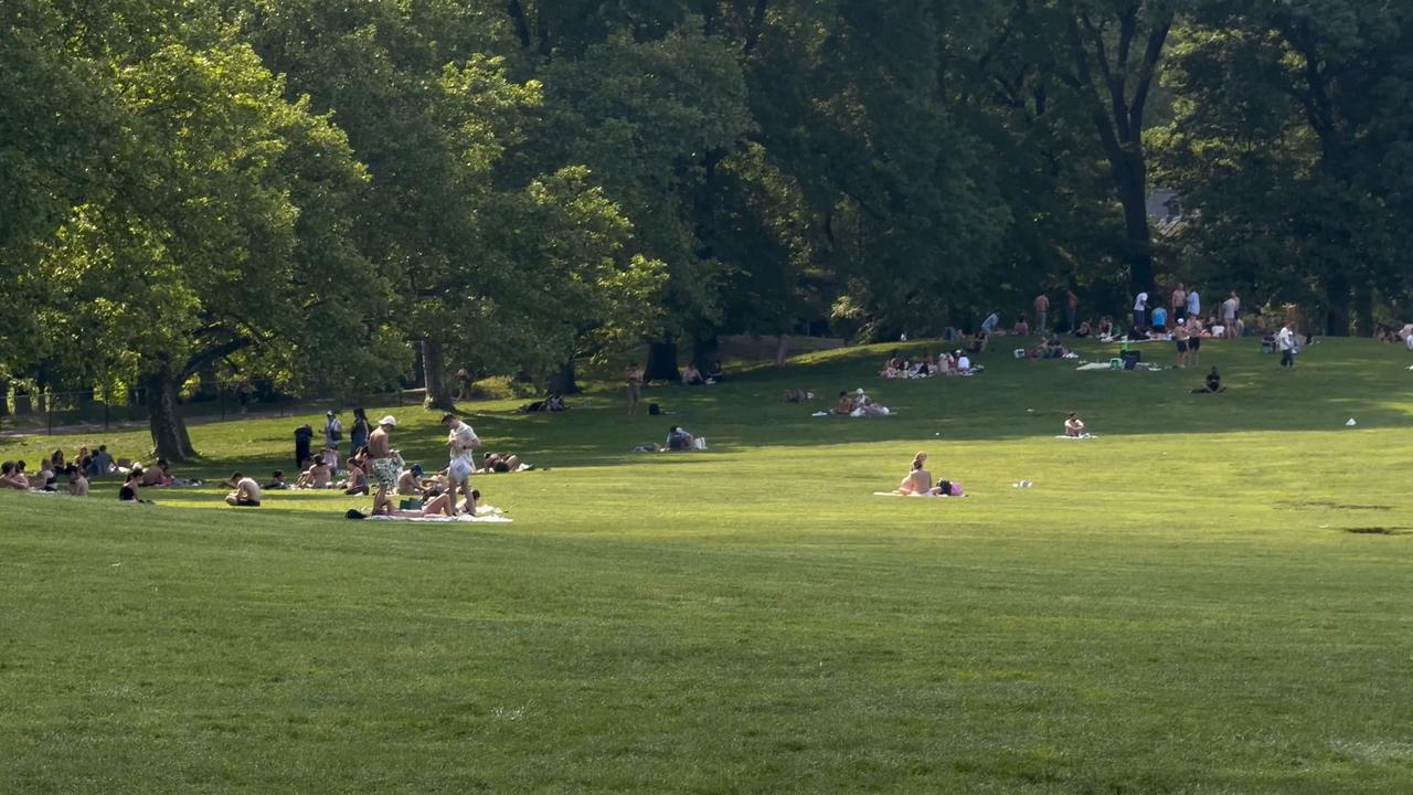 Video thumbnail for US: Central Park Great Lawn -New York City Hit with hottest weather of the year so far 2.