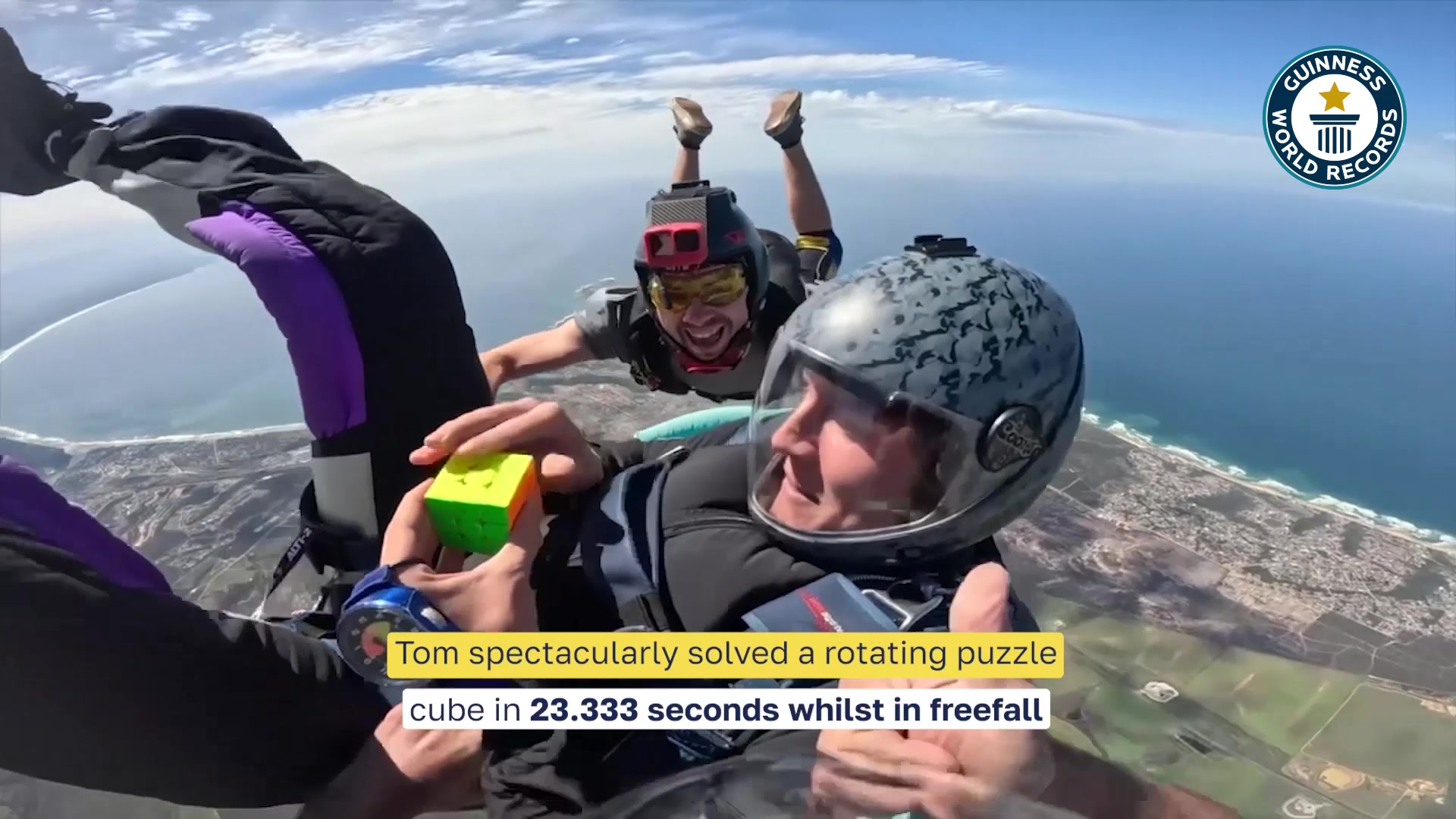 Video thumbnail for Fastest time to solve a rotating puzzle cube whilst in freefall  22.3 seconds by Tom Kopke