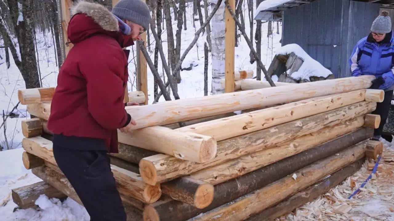 Video thumbnail for nick and maëla: building a cedar log sauna in winter: custom door & cabin construction
