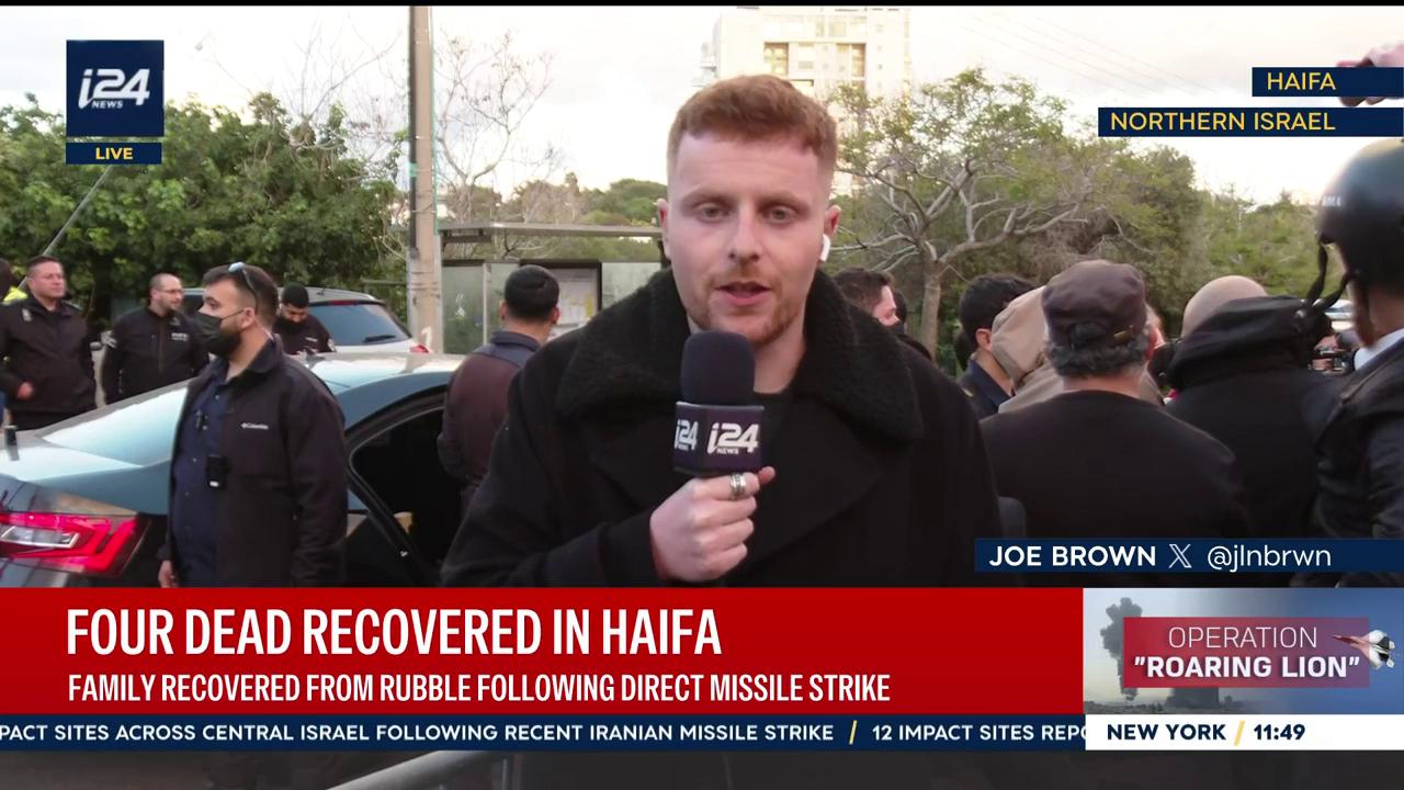 Video thumbnail for Family recovered from rubble following direct missile strike