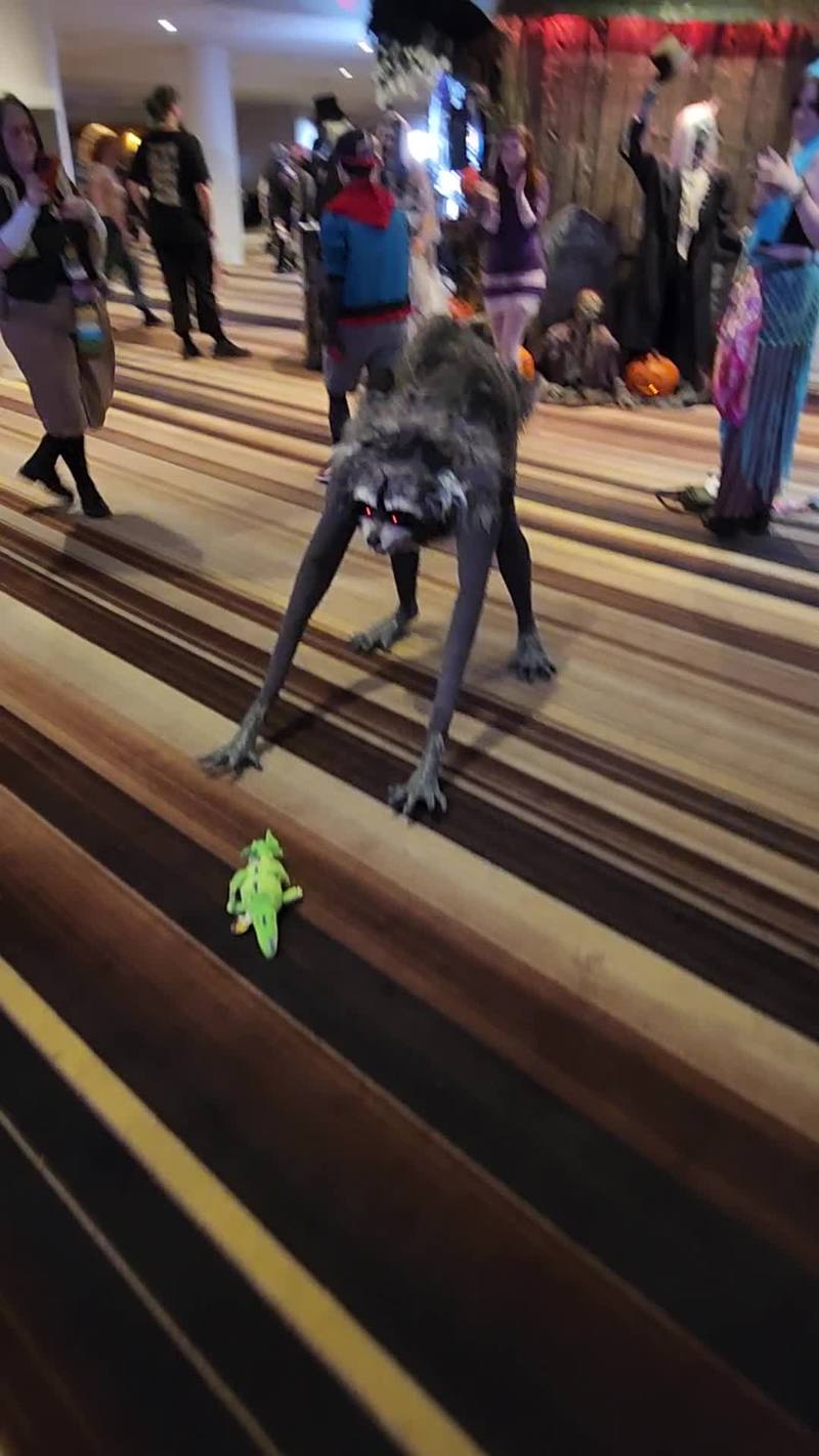 Video thumbnail for Creepy Jimothy Creature Costume Meets Tiny Green Dinosaur