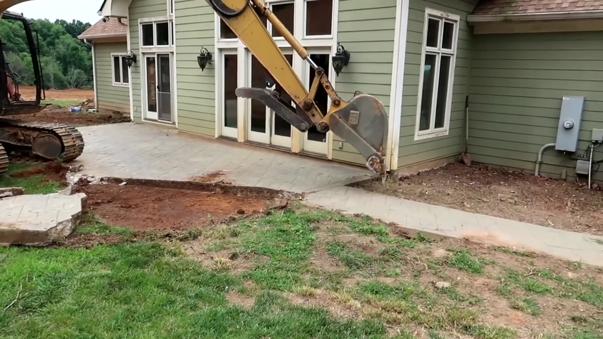 'Video thumbnail for Excavator Removing Concrete Slab'