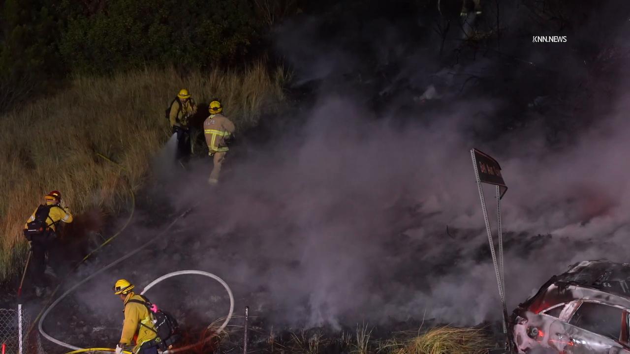 Video thumbnail for US, Los Angeles: Brentwood Brush Fire Ignited by Vehicle Fire on Freeway.