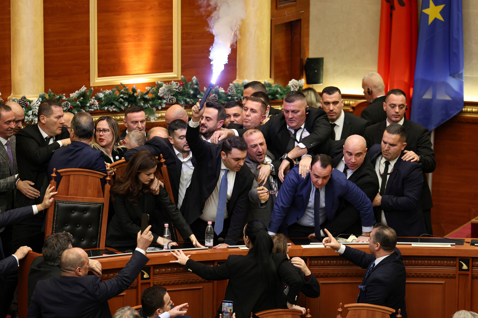Video thumbnail for Flare and fighting in Albanian parliament dispute