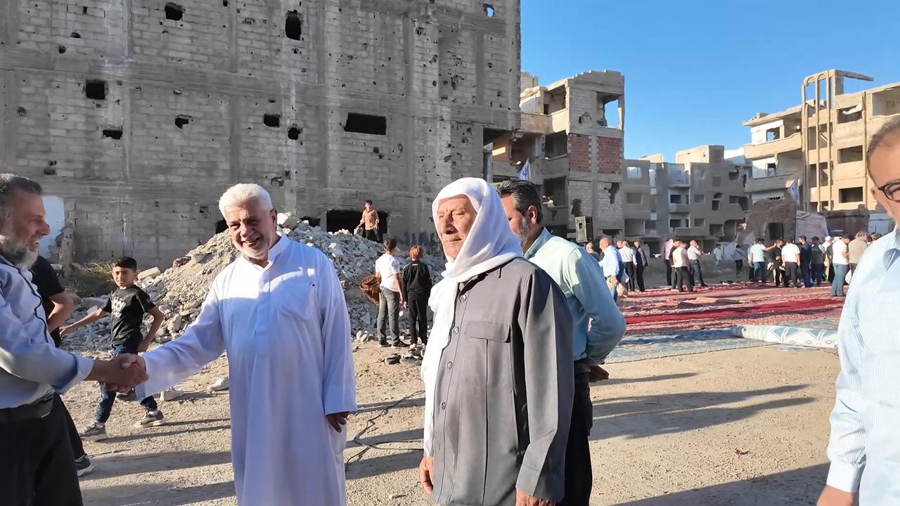 Video thumbnail for Syria: Muslims Gather for Eid al-Adha Prayers in Damaged Square in Syria.