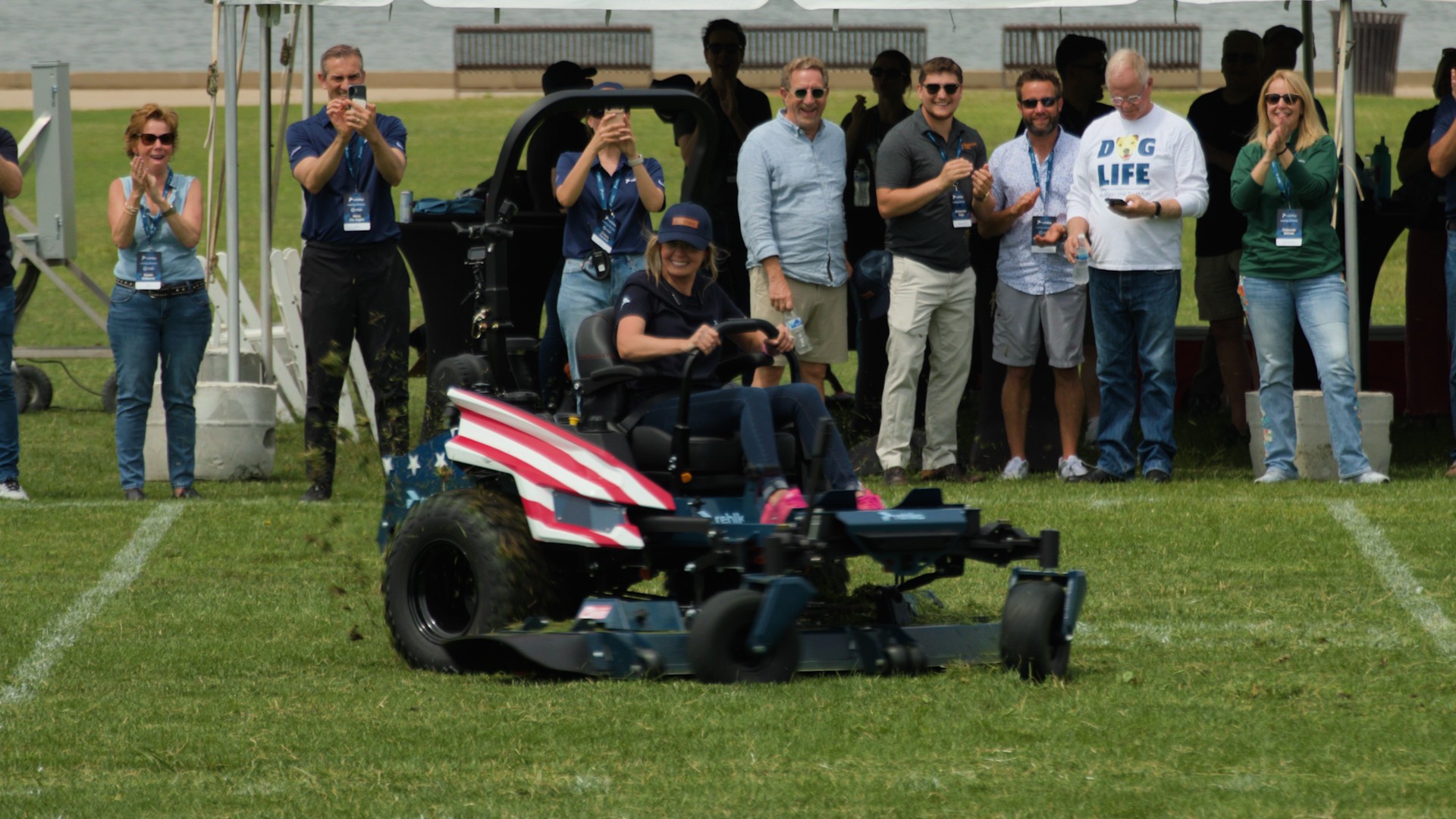 Video thumbnail for Fastest time to mow the area of an American Football field - 14 minutes and 51.06 seconds by Hali Rieman and Rehlko