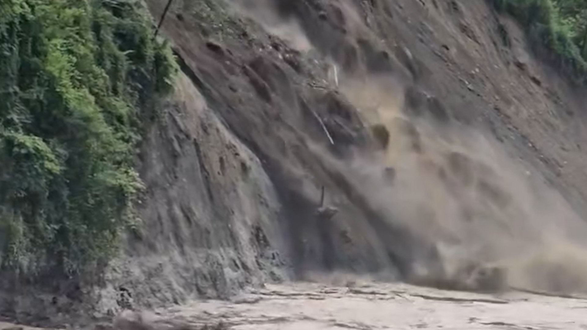 Video thumbnail for Road collapses in Nepal landslide four days after floods