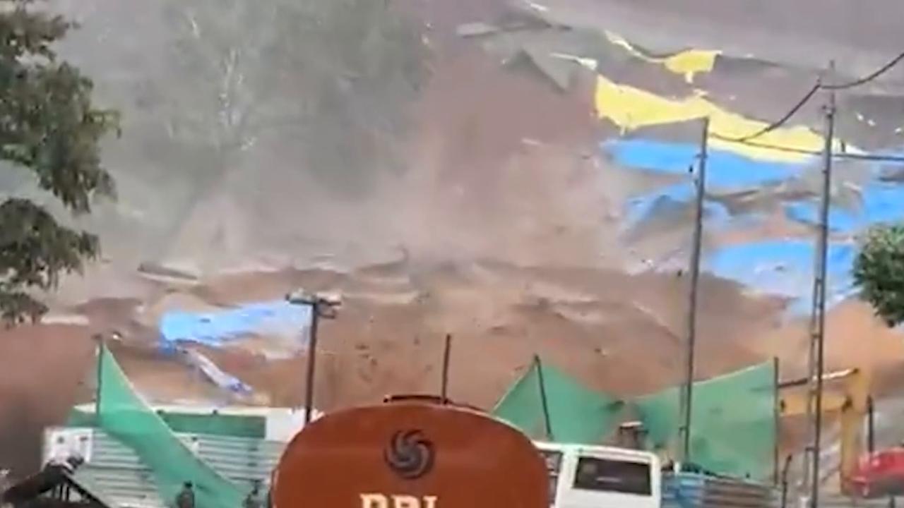 Video thumbnail for India: MOMENT - Heavy rains trigger landslide in southern India's Kerala state.