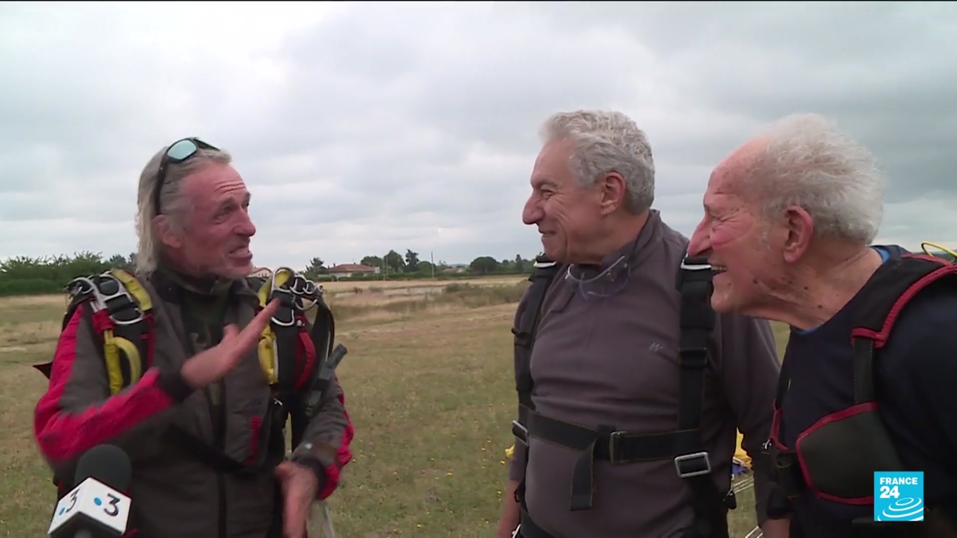 'Video thumbnail for 100-year-old Frenchman breaks skydive record with family'