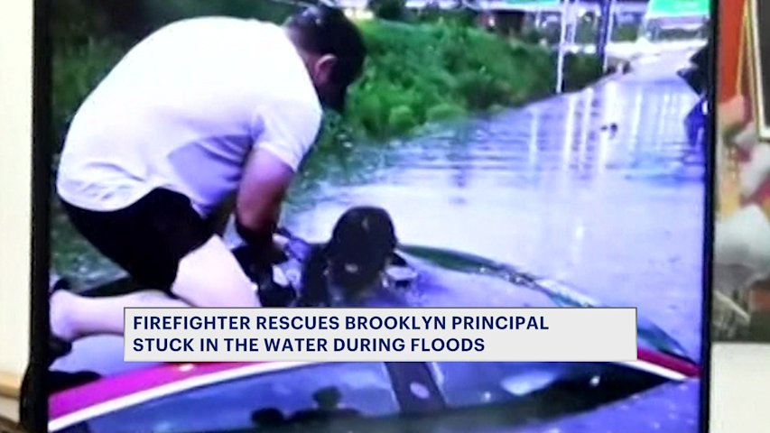 Video thumbnail for Off-duty firefighter rescues Brooklyn principal in flood