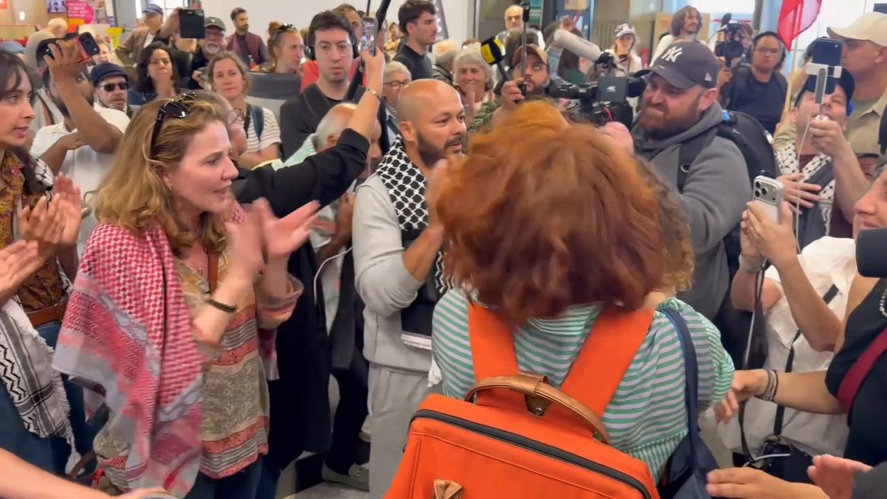 Video thumbnail for France: Supporters welcome freed Gaza flotilla activists at Paris airport following release (3).