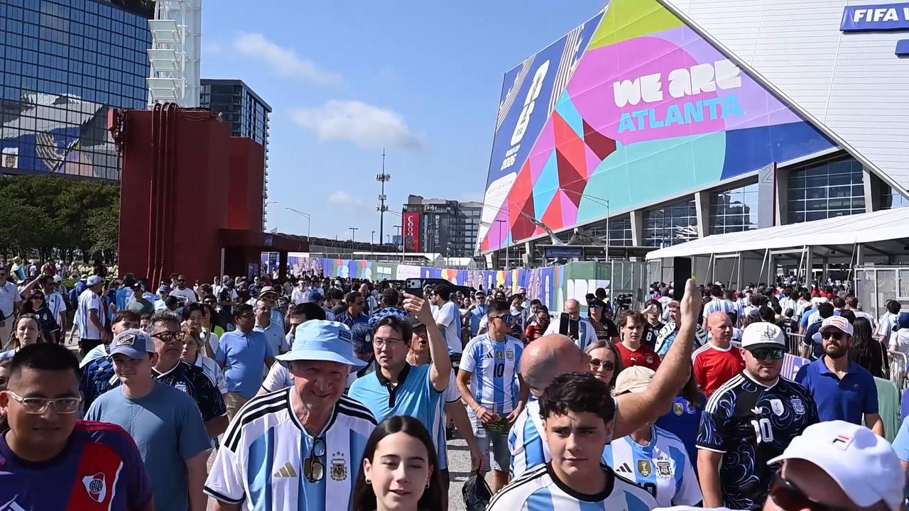 Video thumbnail for US: Fans arrive at Atlanta Stadium ahead of Argentina-Egypt World Cup match.