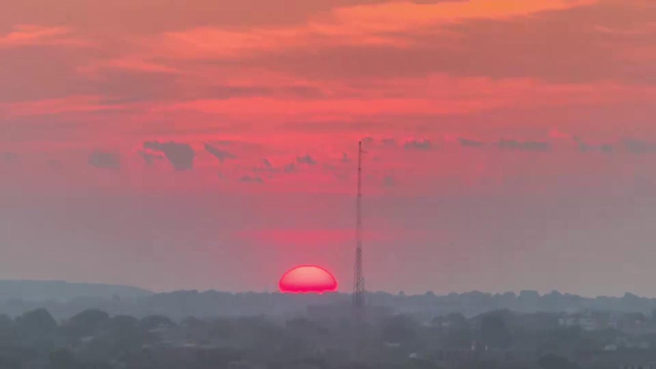Video thumbnail for US: Fiery Red Sunrise Glows Over Fresh Pond And Boston Skyline.
