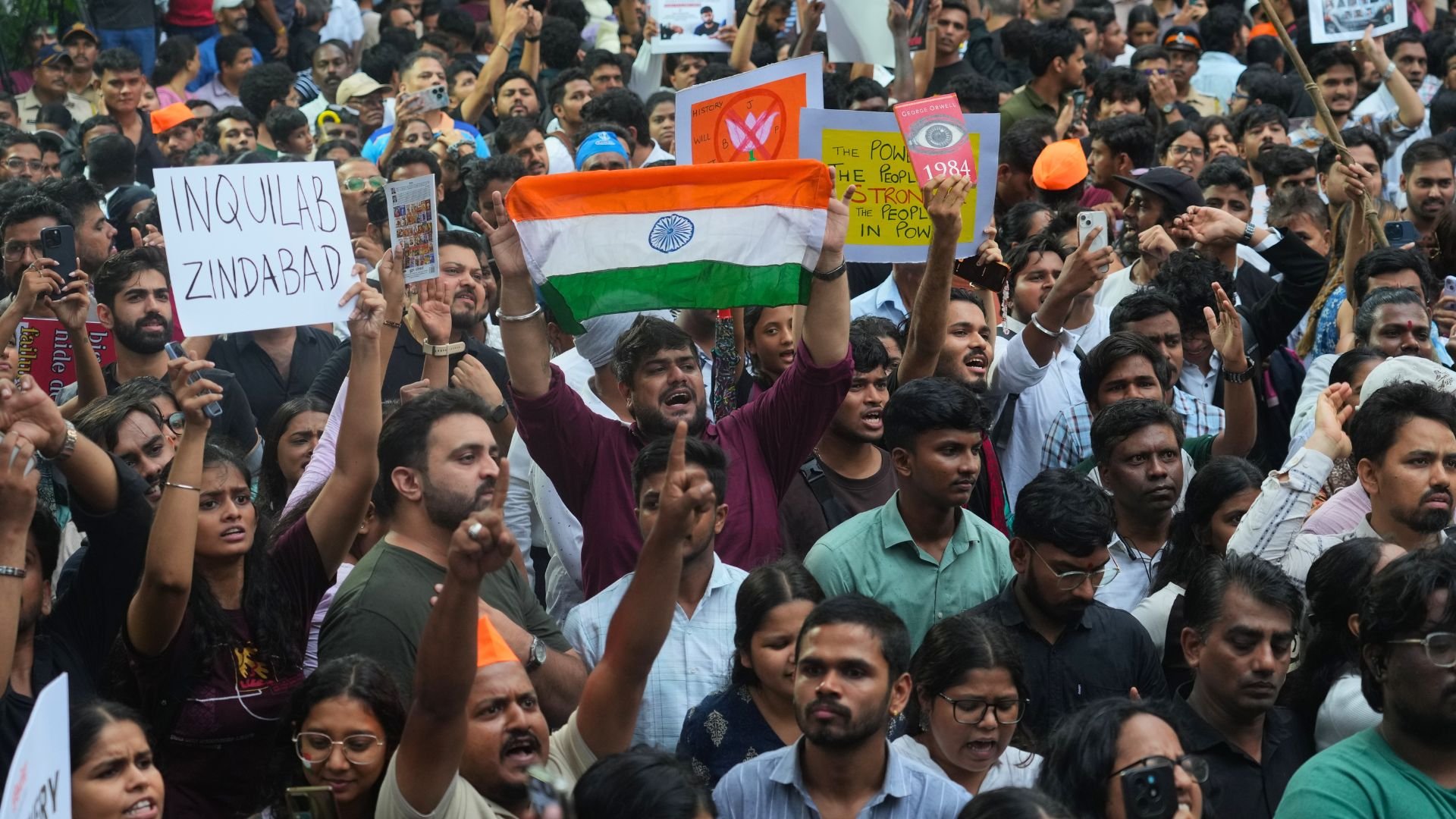 Video thumbnail for India protests: Thousands march on parliament demanding PM Modi’s resignation