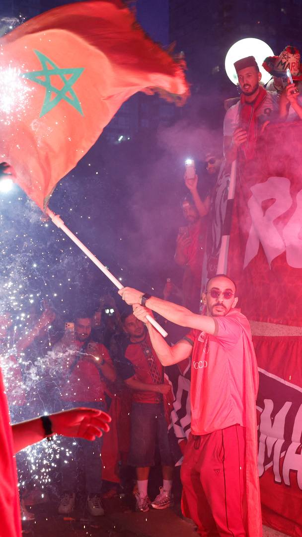 Video thumbnail for Fireworks as Morocco and France fans party ahead of World Cup match