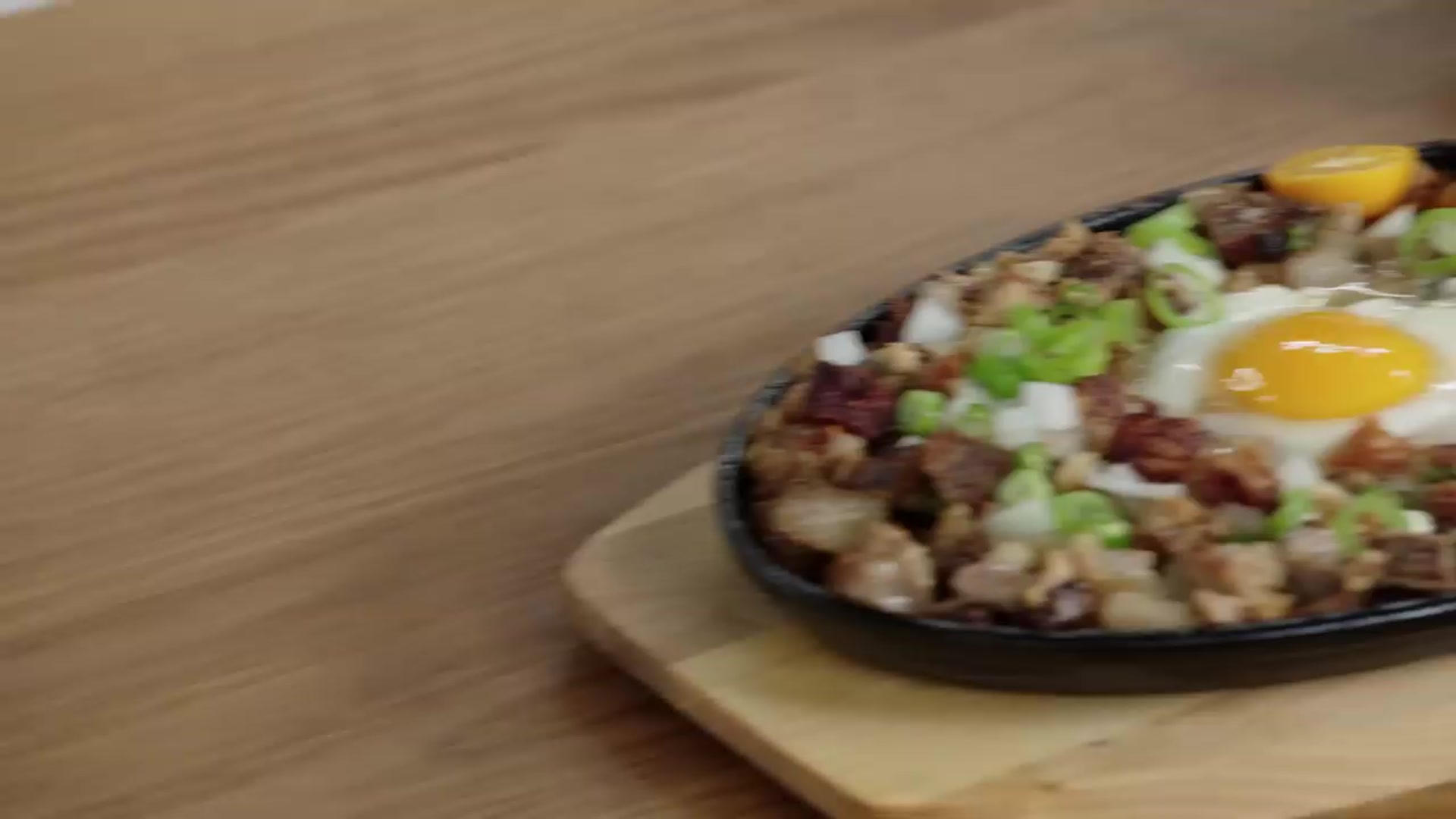 Video thumbnail for How A Filipino Chef Makes Traditional Pork Sisig   Passport Kitchen   Epicurious(720P HD)