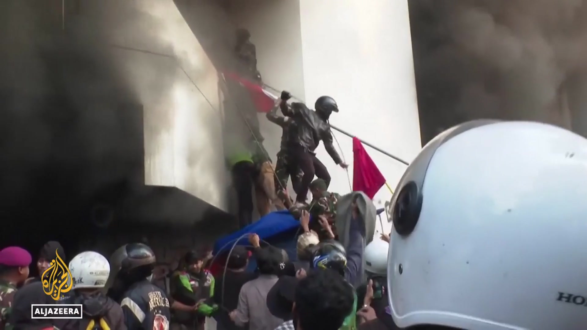'Video thumbnail for Indonesia anti-government protests: Tension soars after delivery rider killed by police'