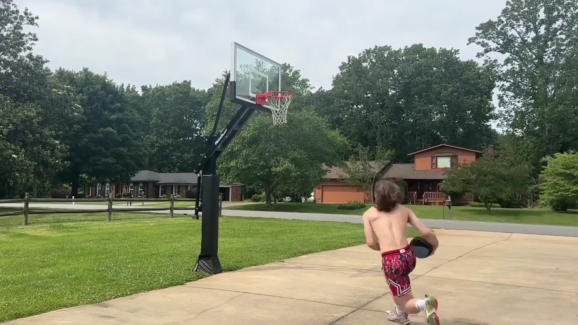 'Video thumbnail for travis reynolds: world record highest behind the back dunk attempt!'