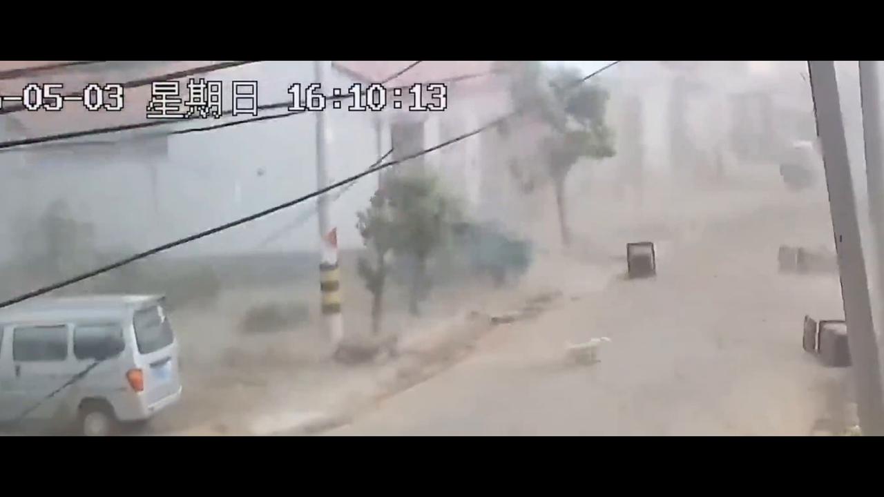Video thumbnail for China: Strong wind pushes runner forward at high speed in China.