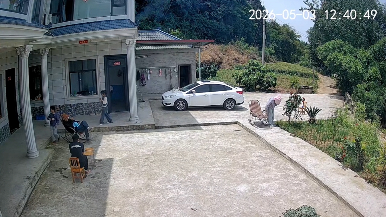 Video thumbnail for Person Falls Off Rocking Chair Outside House in Sichuan