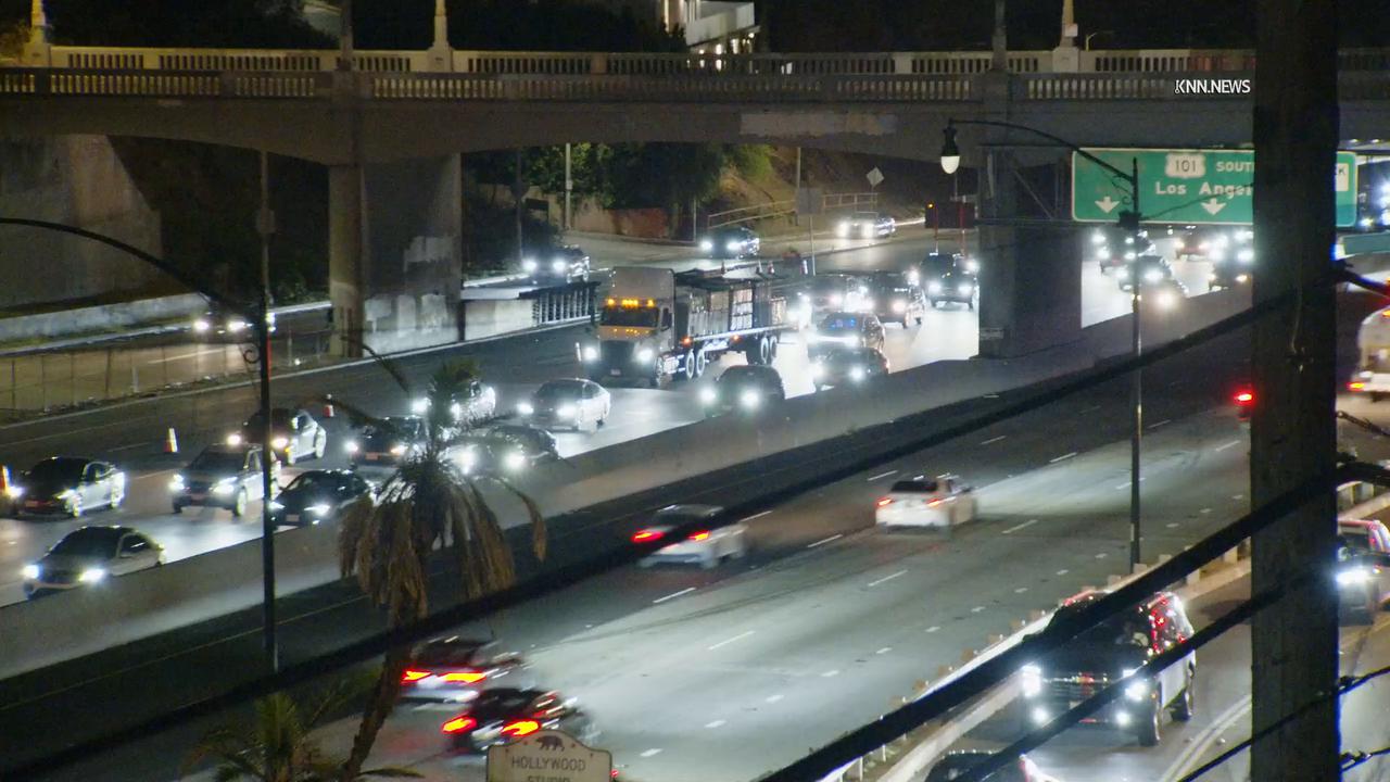 Video thumbnail for US, Tempe: Hollywood Hills System of a Down Promo Stunt Slows Traffic on 101 Freeway.