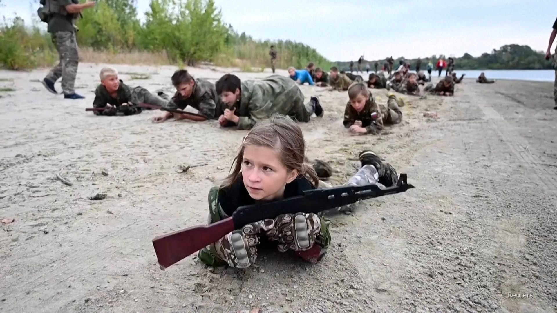 'Video thumbnail for Russian children take part in military training camp: Report'