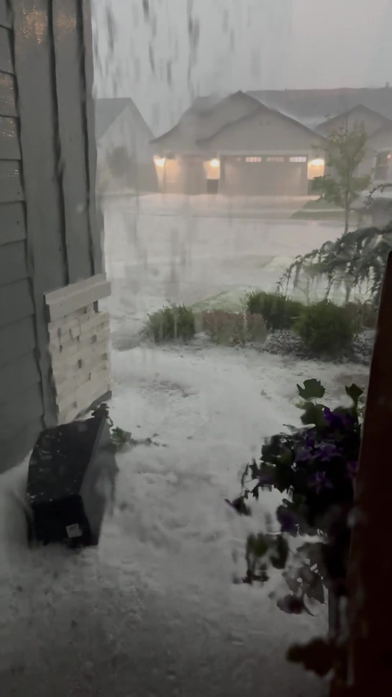 Video thumbnail for Neighborhood Flooded by Sudden Hail and Rain Storm in June