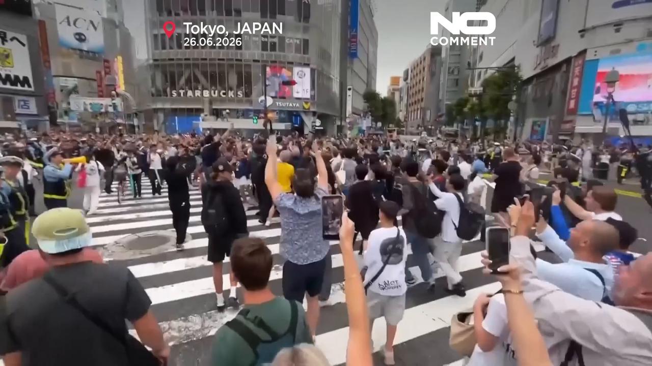 Video thumbnail for Japan fans flood Shibuya as World Cup draw with Sweden sets up Brazil clash