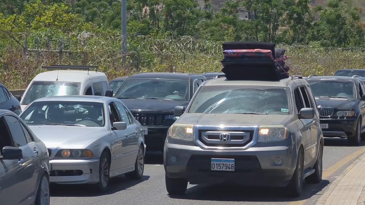 Video thumbnail for Lebanon: Traffic jams form as displaced residents flee southern Lebanon amid continued Israeli attacks.