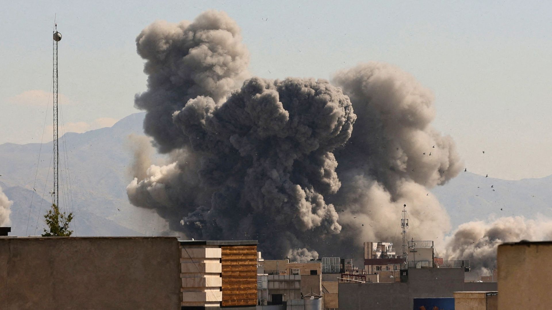 Video thumbnail for Plumes of smoke rise after Israel strikes ‘heart’ of Tehran