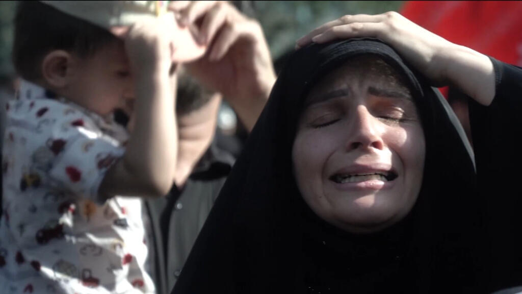 Video thumbnail for In Tehran, funeral attendees grieve the loss of supreme leader Ali Khamenei
