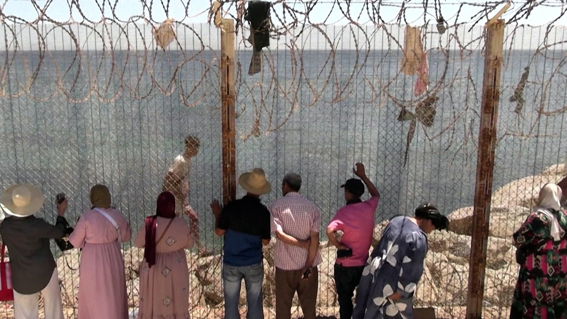 Video thumbnail for Families search for loved ones after deadly Ceuta crossings