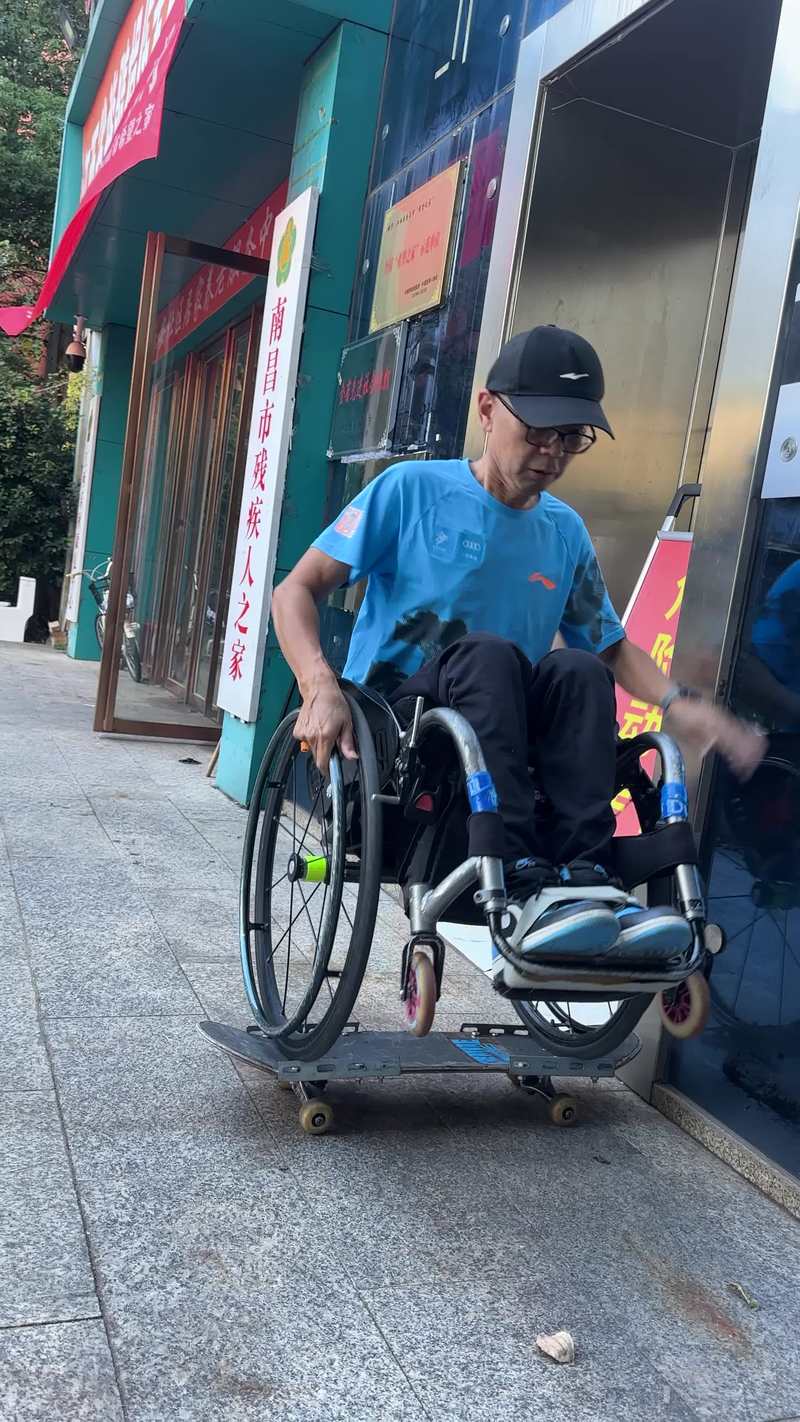 Video thumbnail for Wheelchair Athlete Rolling on a Modified Skateboard