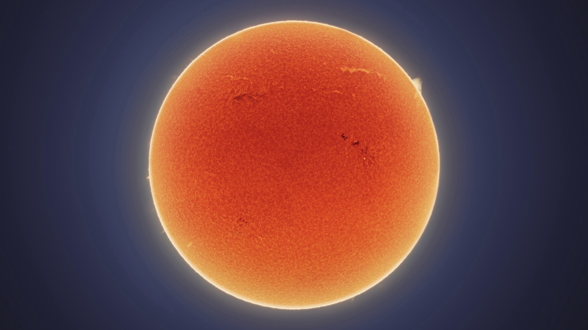 Video thumbnail for Stunning photo captures the ISS passing in front of the Sun