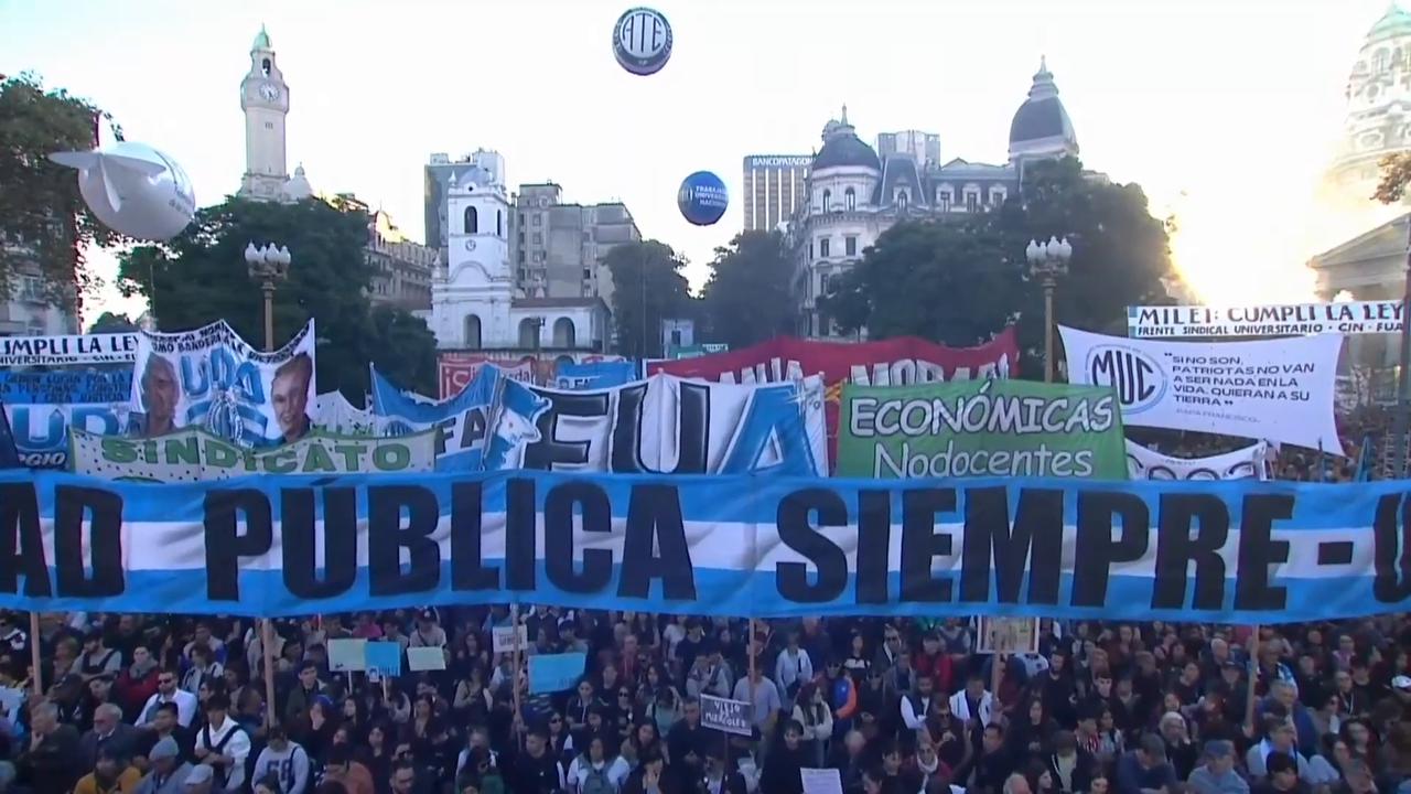 Video thumbnail for Argentina: Thousands march in Buenos Aires over Argentina university funding dispute (drone).
