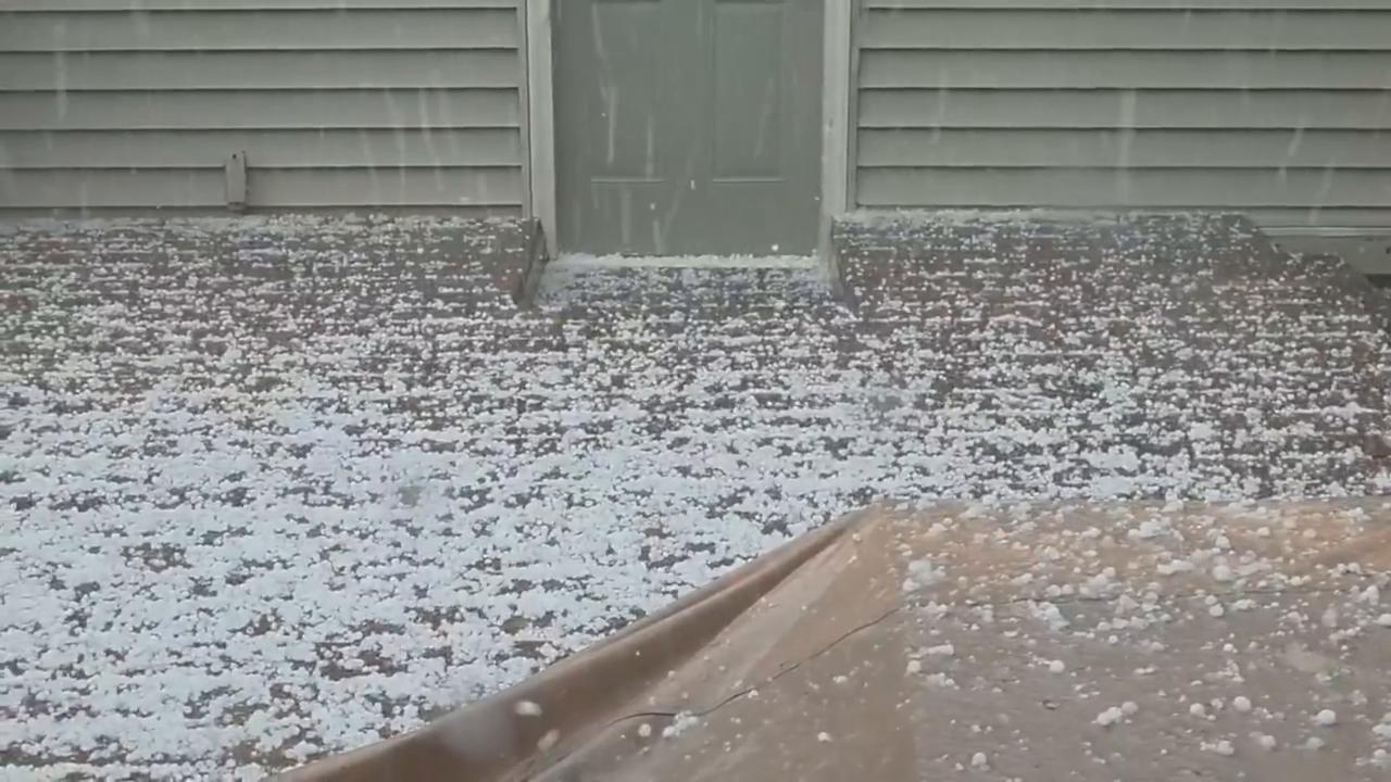 Video thumbnail for US: Hail Blankets Minnesota Neighborhood as Storm Turns Yards White Near Minneapolis.