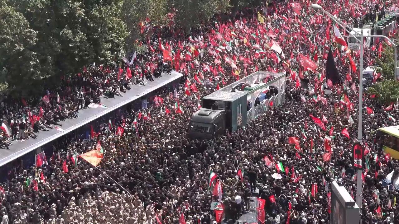 Video thumbnail for Iran: Body of Iran’s former Supreme Leader Khamenei carried in Tehran funeral procession (2).