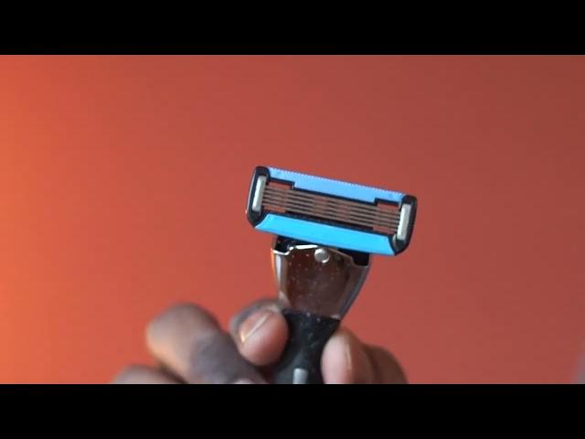 Video thumbnail for An Overview Amazon Basics 5 Blade MotionSphere Razor for Men with Precision Beard Trimmer