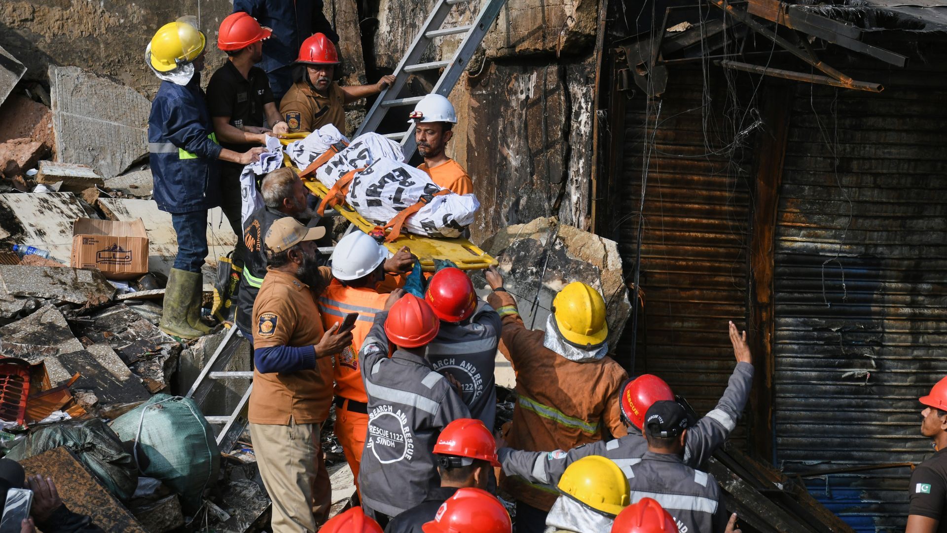 Video thumbnail for Pakistan's Karachi mall fire death toll rises to at least 26 and dozens still missing